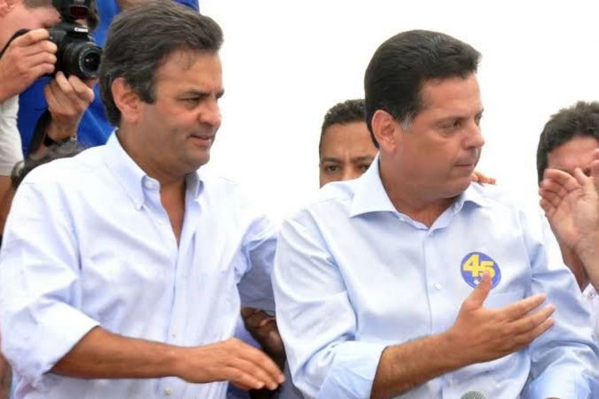 Site destaca que Marconi tem como missão reabilitar Aécio Neves